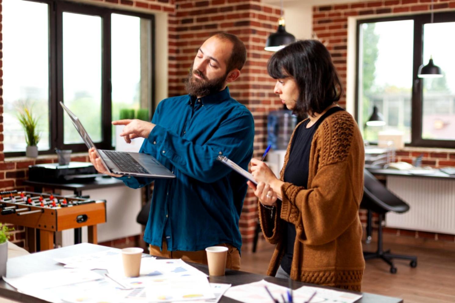 Professional financial planning workspace with documents and calculators